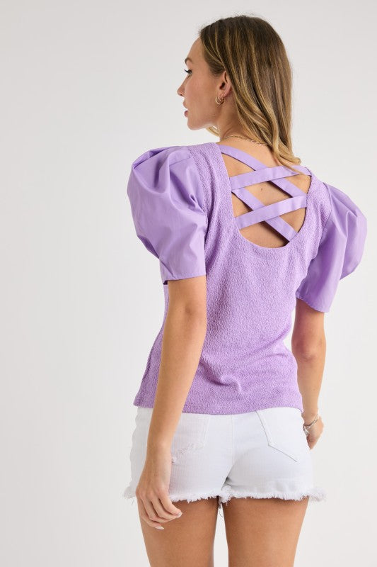Textured knit and poplin woven sleeve mixed top