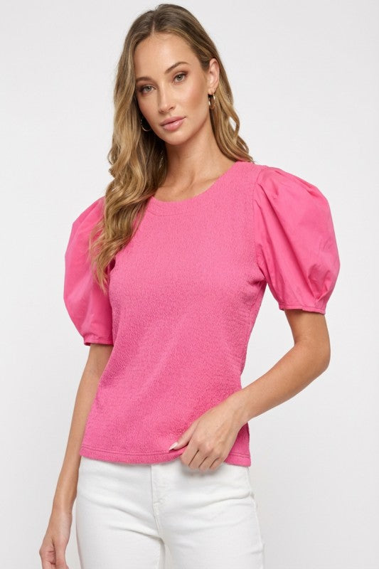 Textured knit and poplin woven sleeve mixed top