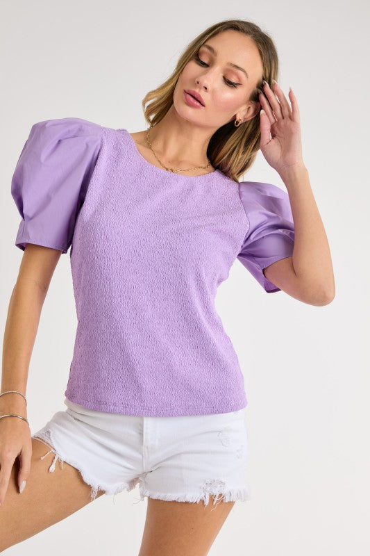 Textured knit and poplin woven sleeve mixed top