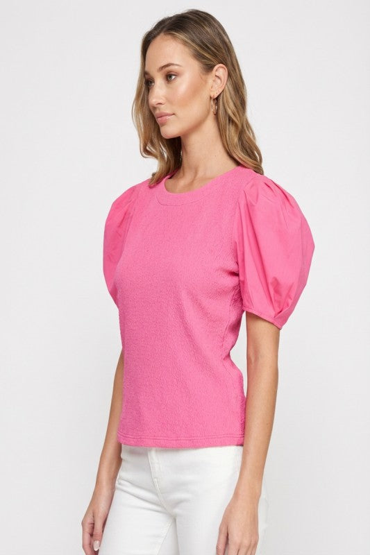 Textured knit and poplin woven sleeve mixed top
