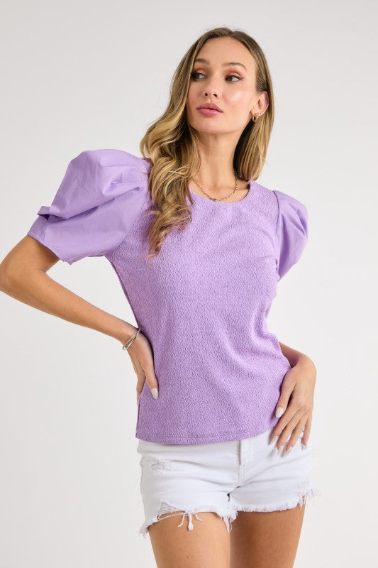 Textured knit and poplin woven sleeve mixed top