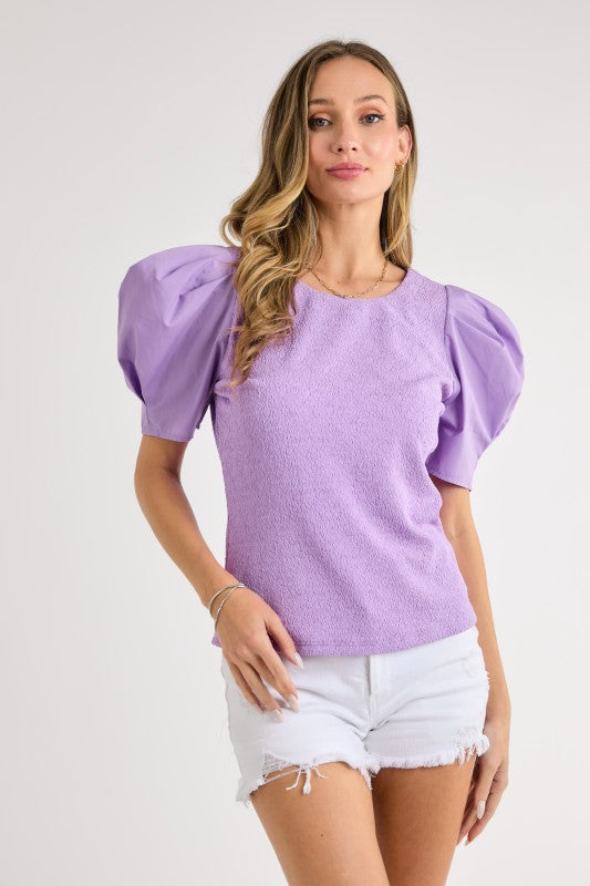 Textured knit and poplin woven sleeve mixed top